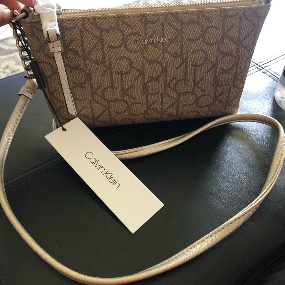Brand new Calvin Klein crossbody in CK print